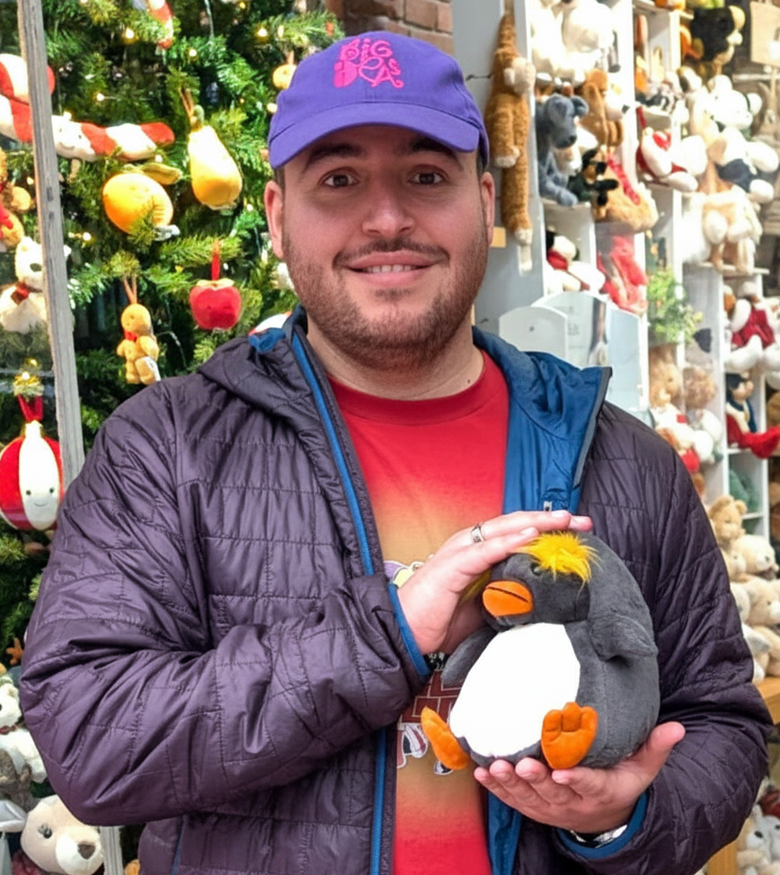 Alon Torres with Maurice the grumpy penguin
